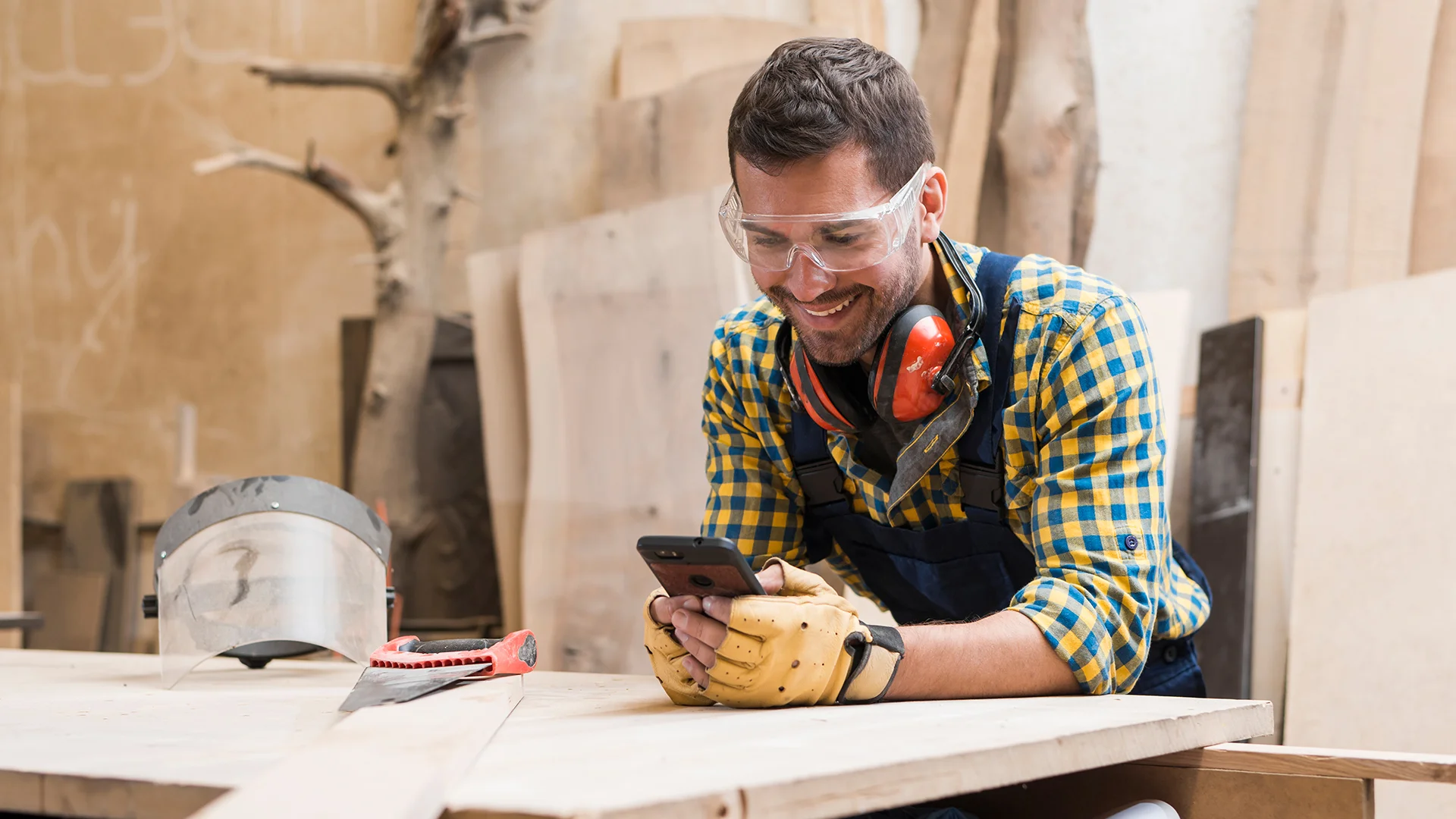 carpenter wearing safety glasses